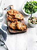 Prawn and coconut fritters with cucumber pickle