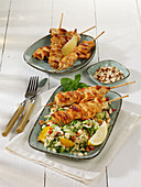 Chicken skewers on couscous