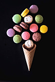 Colourful macarons and waffle cone