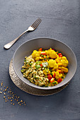 Cauliflower curry with turmeric and millet