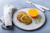 Spinach and millet fritters with pumpkin and turmeric ketchup
