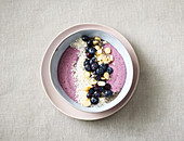 Blueberry bowl with coconut drink and silken tofu