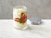 Chicken breast rice salad in a jar to go