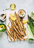 Fried asparagus fries with garlic dip