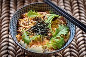Japanese rice bowl with meat and seaweed