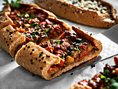 Pide with minced meat and spinach filling