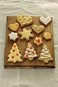 Various christmas cookies shaped as hearts, stars and trees