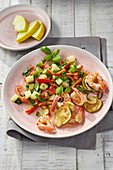 Melon and pepper salad with fried garlic prawns