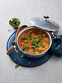 Indian vegan lentil stew with sweet potatoes and spinach