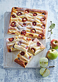 Cheesecake with apple and plums
