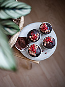 Chocolate muffins with pomegranate seeds