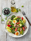Salad with tuna, boiled eggs, and olives