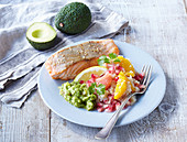 Salmon with avocado and citrus fruits