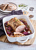 Roast pork with ginger and red onions
