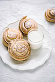 Sweet cottage cheese rolls with a glass of milk