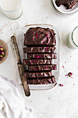 Double Chocolate Loaf with chocolate frosting and rose petals