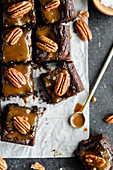 Brownies with salted caramel and pecan topping