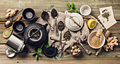 Various tea and teapots composition, dried herbal, green, black tea and matcha tea