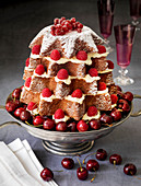Italian Christmas Pandoro served with raspberries and cherries