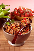 Beef with beans and tomatoes