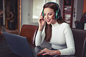 Young woman working in home office