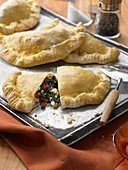Spicy spinach pockets with ricotta and dried tomatoes