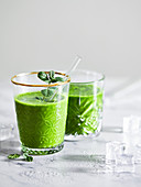 Green spinach and herb smoothies