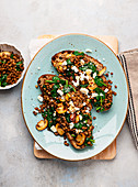 Lentil and spinach bruschetta with feta cheese