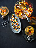 Quail eggs with trout caviar and cress, Citrus punch (Christmas)