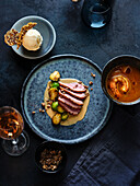 Christmas menu – duck breast with Brussels sprouts, pumpkin essence and ginger ice cream