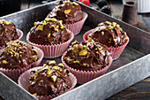 Chocolate muffins with pistachios