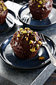 Chocolate muffins with pistachios