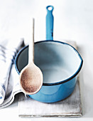 French Blue Saucepan and Wooden spoon with linen cloth