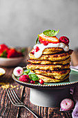 Pancakes with raspberries, pomegranate and yoghurt
