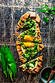 Galette with wild garlic, sour cream and egg