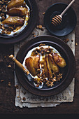 Granola with vegan yoghurt and caramelized pears