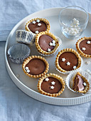 Chocolate Christmas tartles with nougat