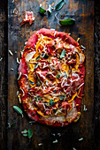 Butternut and bacon pizza with beetroot and sage