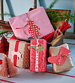 Wrapped Christmas gifts with DIY paper tags