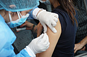 Person being injected with Pfizer-BioNTech Covid-19 vaccine
