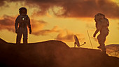 Silhouettes of two astronauts exploring a red, alien planet