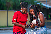 Woman having her hair braided