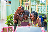 Children using digital tablet