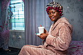 Woman relaxing with hot drink