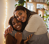 Happy mother and daughter hugging