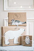 DIY gift wrap with winter animals made of paper