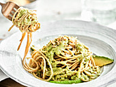 Spaghetti with avocado pesto sauce