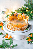 Medovik (Russian honey cake) with tangerine jelly and tangerines