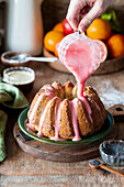Blood orange cake with poppy seeds and icing