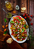 Caprese with cherry tomatoes of different colors and sizes
